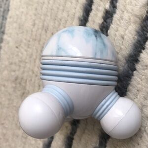 White and Blue Handheld Massager